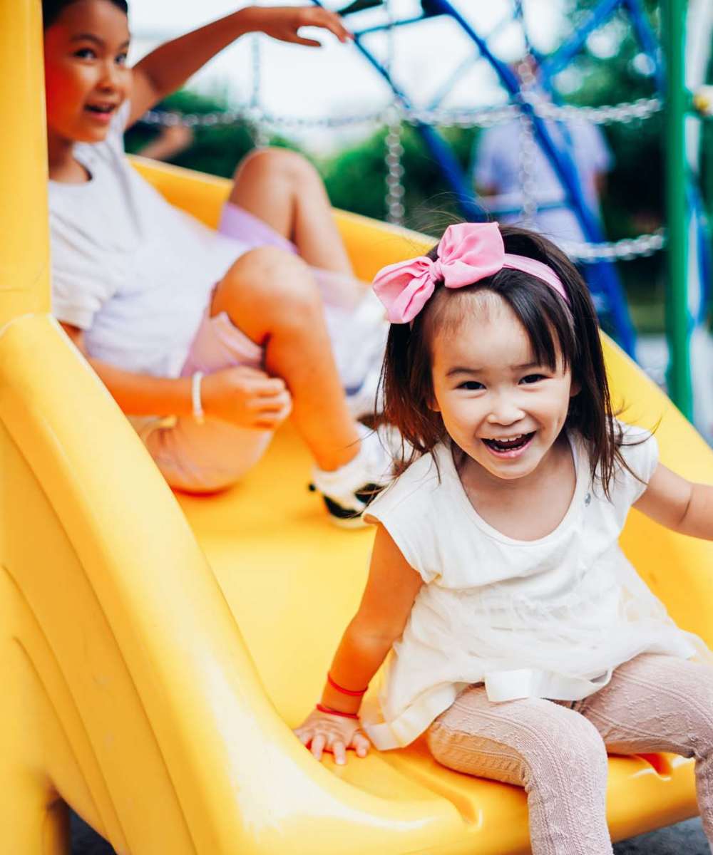 Kids playing on the slides near Ambrose in Bremerton, Washington   