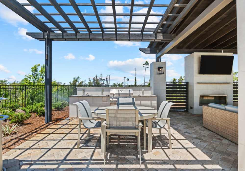 Outdoor BBQ and lounge at Mexico Beach Crossings in Mexico Beach, Florida 