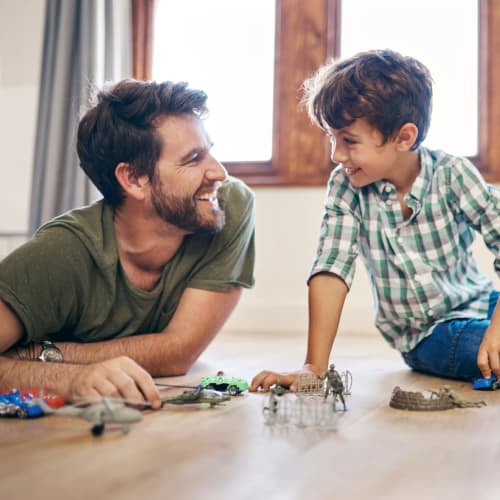 A father and son playing at Eucalyptus Ridge in Lakeside, California