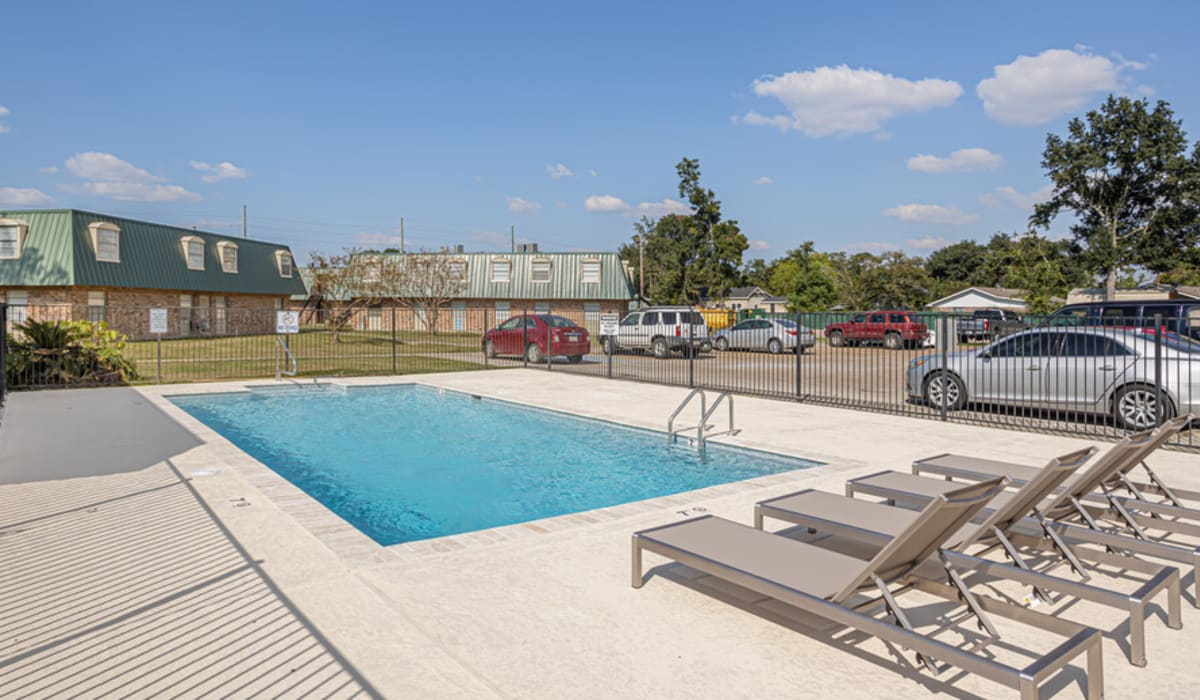 Resident enjoying in the swimming pool at Chandler in Lake Charles, Louisiana