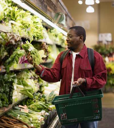 Resident in grocery shop at Stonehurst Manor and Harrison Court in Upper Darby Township, Pennsylvania