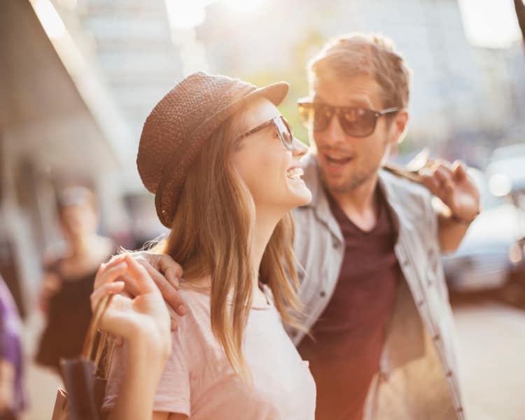 Young couple having fun in city area near Augusta Meadows