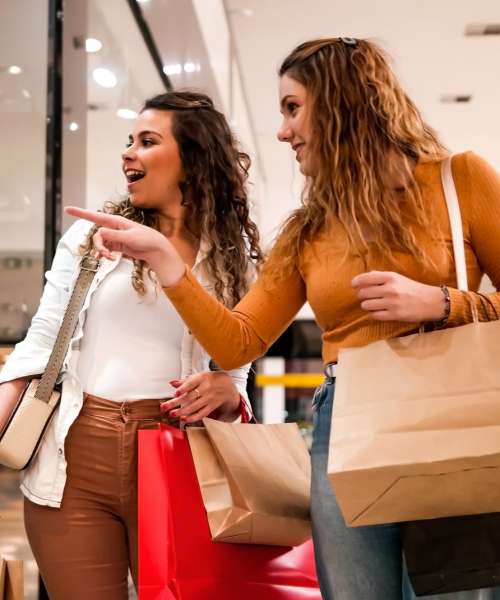 Women shopping at a mall near The Crossroads At Downtown Boca in Boca Raton, Florida