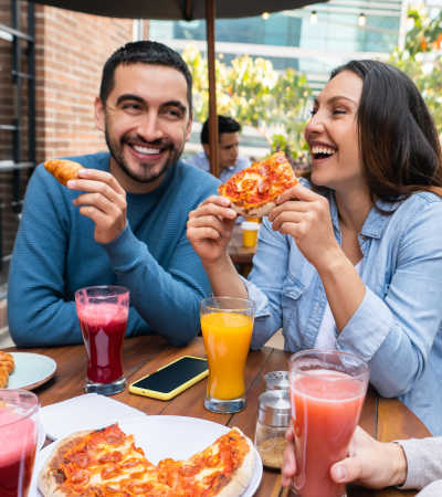 Resident friends eating food at a favorite restaurant near Sagewood Estates in Portland, Oregon