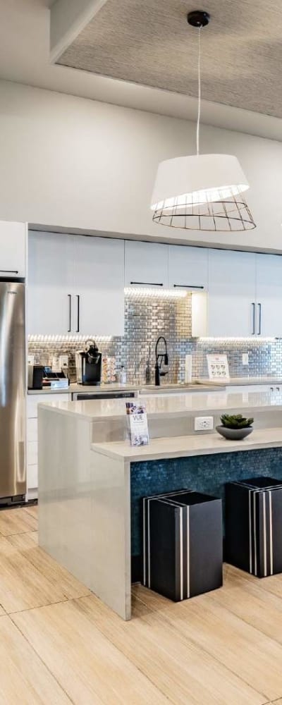 Modern apartment kitchen with stainless steel appliances at Waters Pointe at Robbins Property Associates, LLC in Tampa, Florida