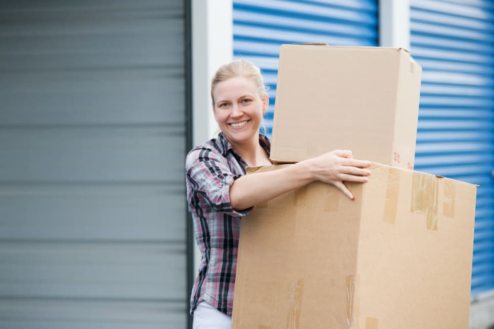 Moving boxes to one of Devon Self Storage self storage locations