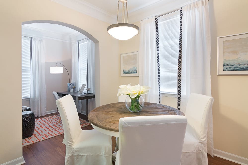 Dining room table and office desk in model apartment at Landings at Four Corners in Davenport, Florida