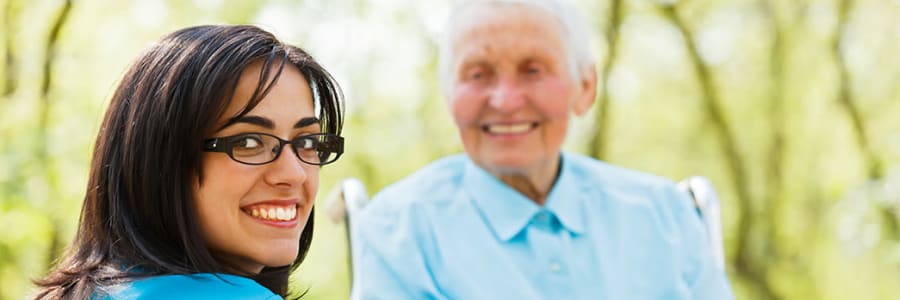 Caregiver and resident at Villas At Maple Ridge in Spooner, Wisconsin