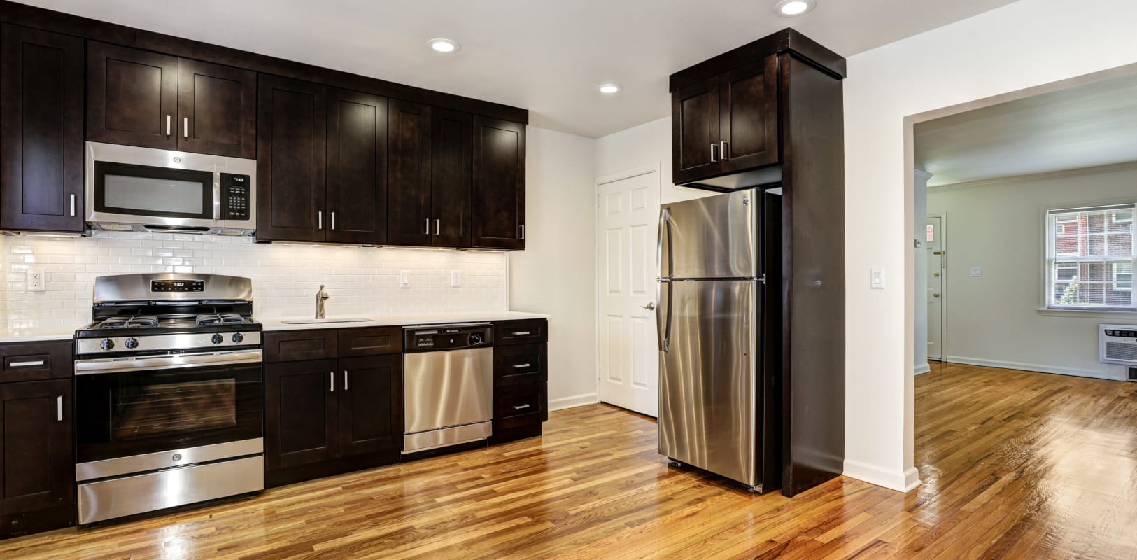 Kitchen with stainless-steel appliances at General Wayne Townhomes and Ridgedale Gardens in Madison, New Jersey