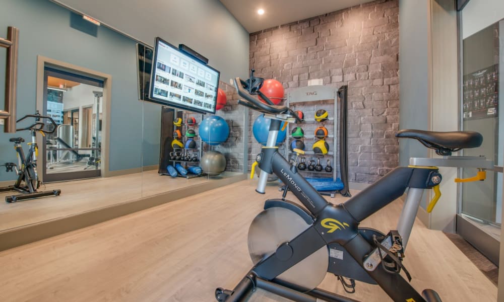 Fitness center with everything to break a sweat after a long day at work at Bellrock Upper North in Haltom City, Texas