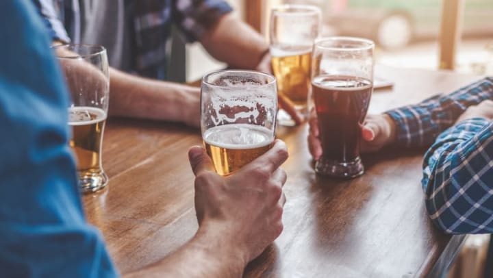 Residents enjoying beers at a local happy hour near Legends at White Oak in Ooltewah, Tennessee
