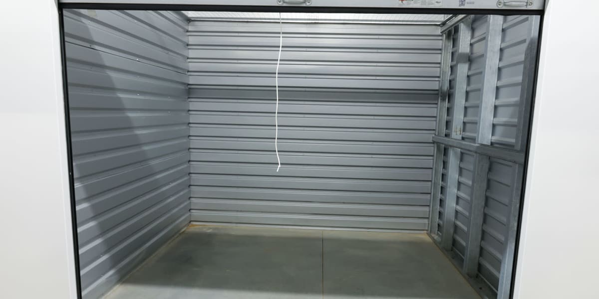 An open storage unit at Avid Storage in Niceville, Florida