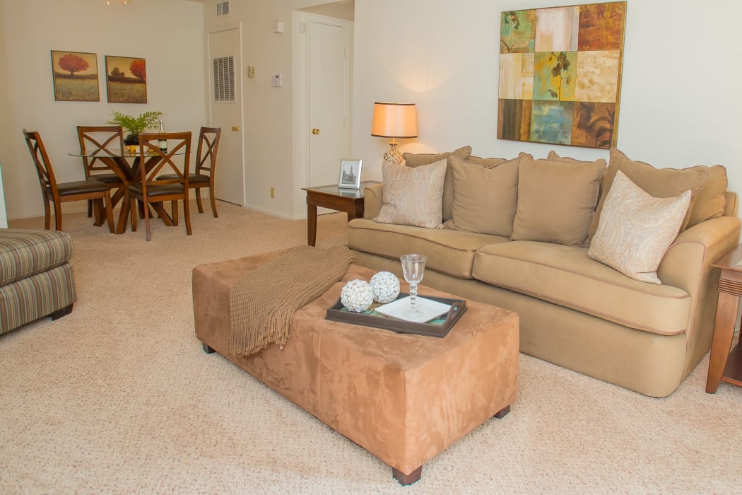 Bright living room at Riverpark Apartments in Tulsa, Oklahoma