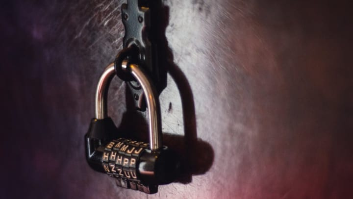 Combination lock on a door at an escape room near Olympus Grand Crossing in Katy, Texas