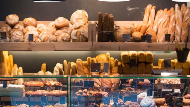 Selection of breads and pastries at a bakery near Olympus 7th Street Station in Fort Worth, Texas