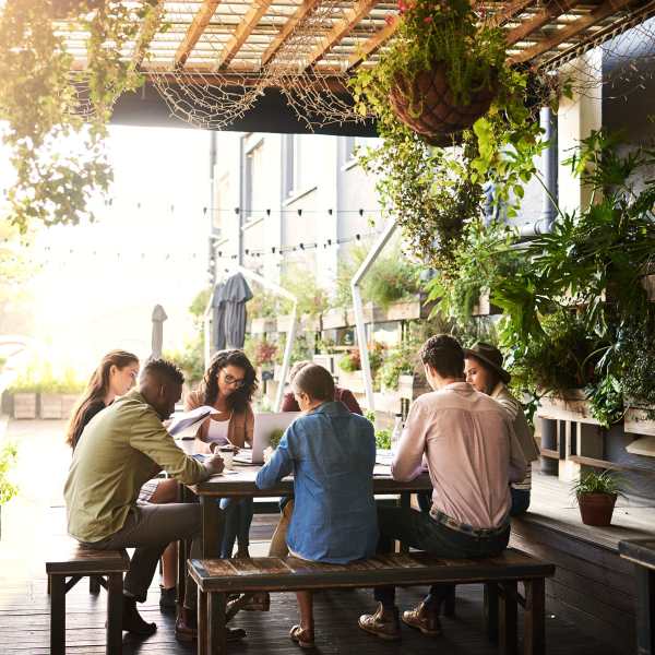 Group of resident having food at café near Casa in Corpus Christi, Texas