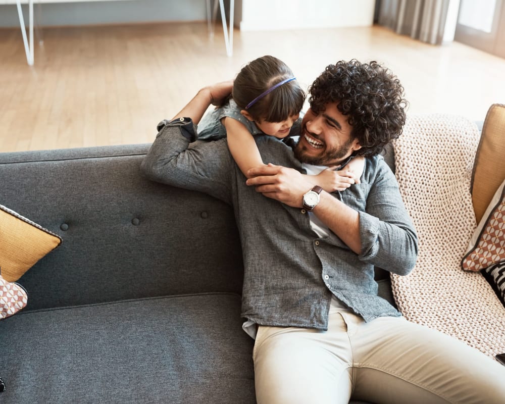 Resident hugging his daughter at Rose Hill Estates in Norwich, Connecticut 