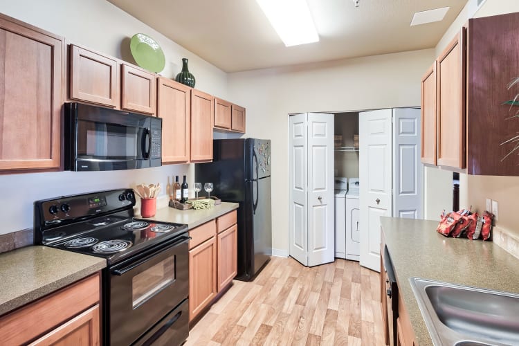Model kitchen and washer/dryer at Selway Apartments