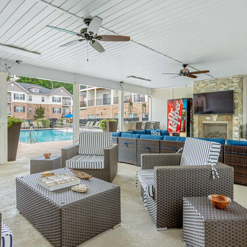 Outdoor Lounge Area By Pool at Retreat at the Park in Burlington, North Carolina