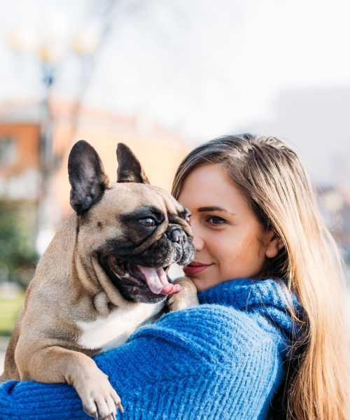 Resident holding her pup at Durham Park in Pooler, Georgia