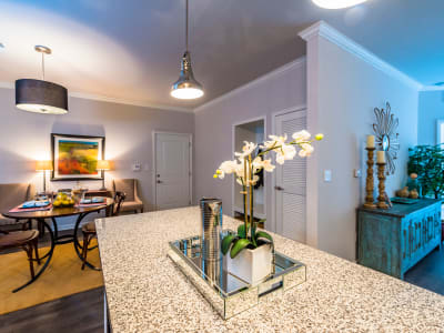Partial view of the dining and living areas from a model home's kitchen at Valley Farms in Louisville, Kentucky
