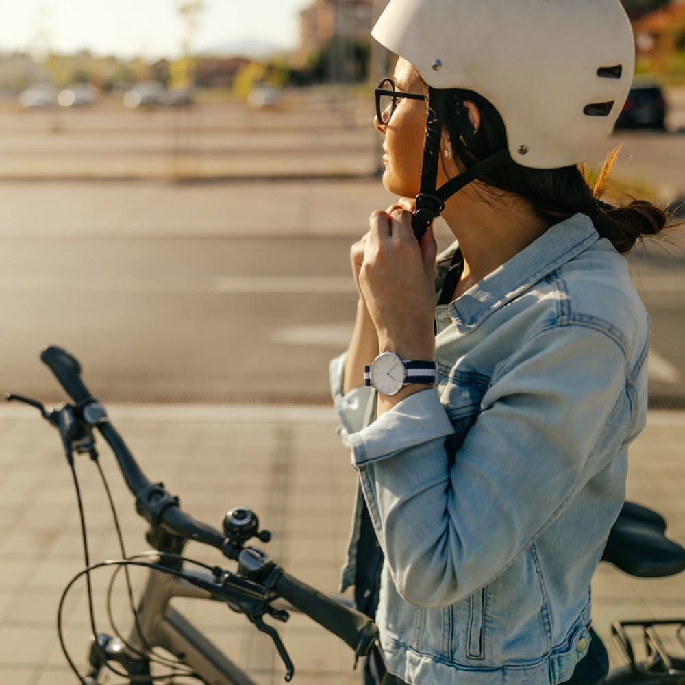 Residents on her bike near The Columns at Westchase in Houston, Texas