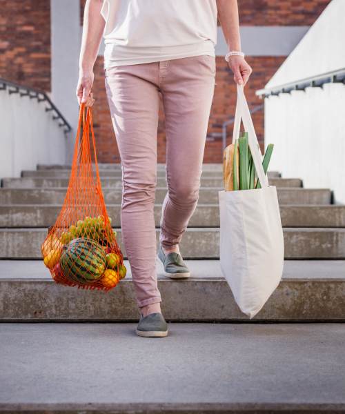 Resident carrying groceries near Linden in Portland, Oregon