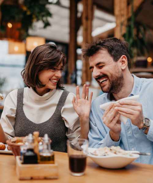 Couple happily eating their food near View at Blossom Hill in San Jose, California