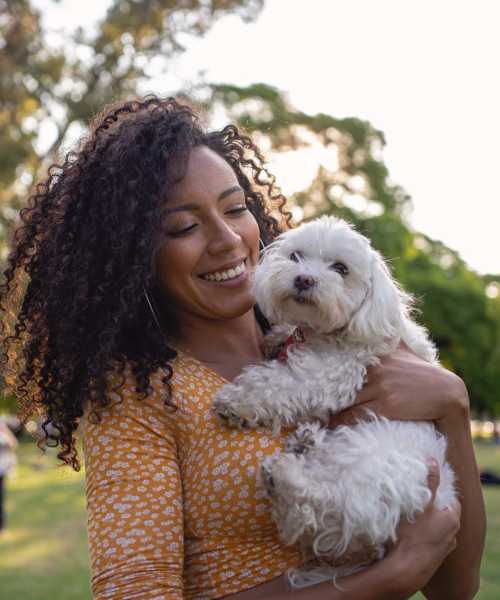 Resident holding her pet near Brookside Commons in Meadville, Pennsylvania