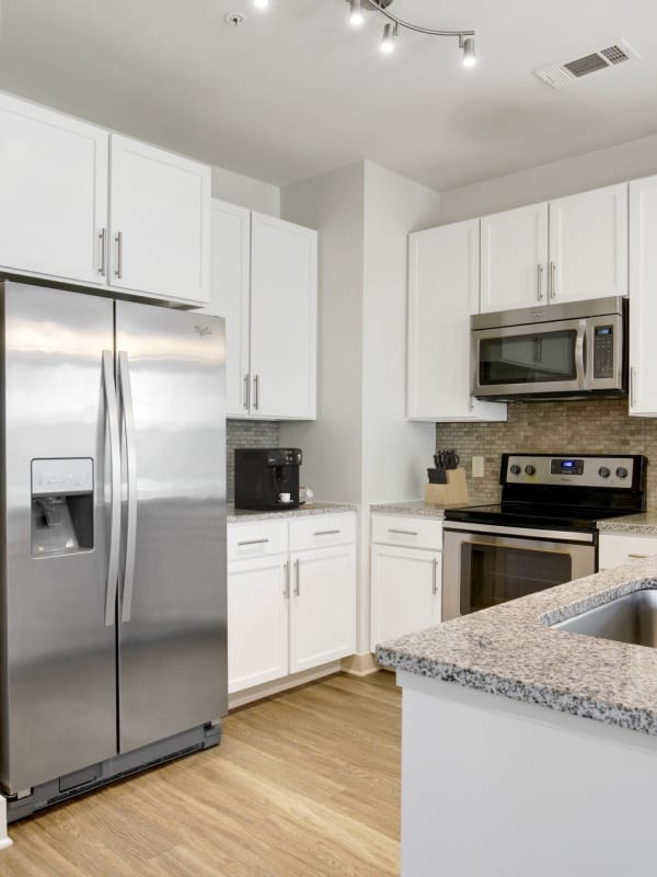 Kitchen with stainless-steel appliances at Lantower Waverly in Charlotte, North Carolina