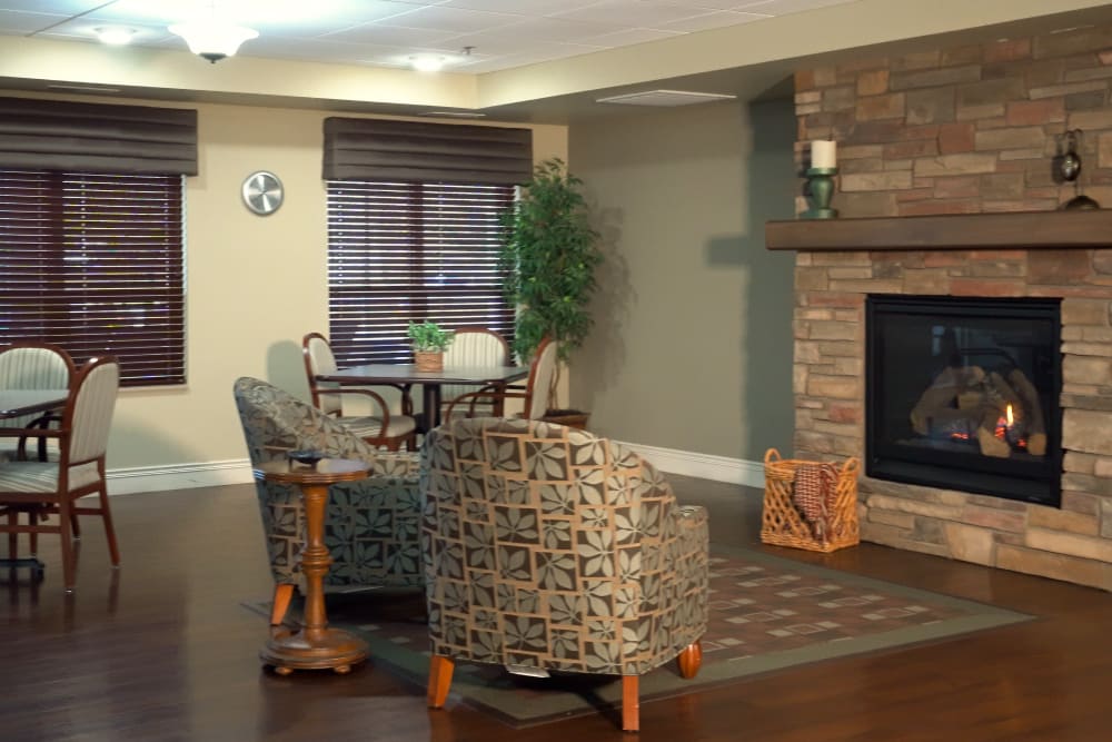Fireplace Lounge seating inside Deephaven Woods in Deephaven, Minnesota