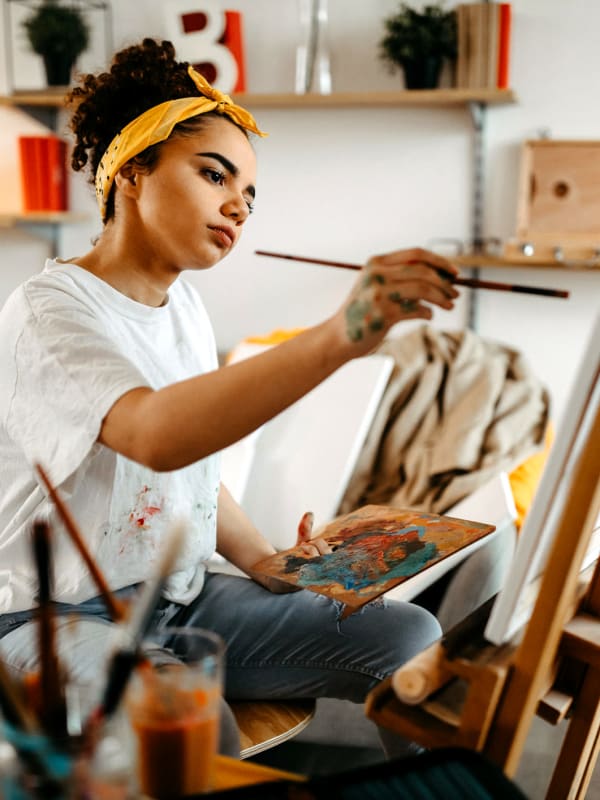Woman painting at Bellrock Upper North in Haltom City, Texas