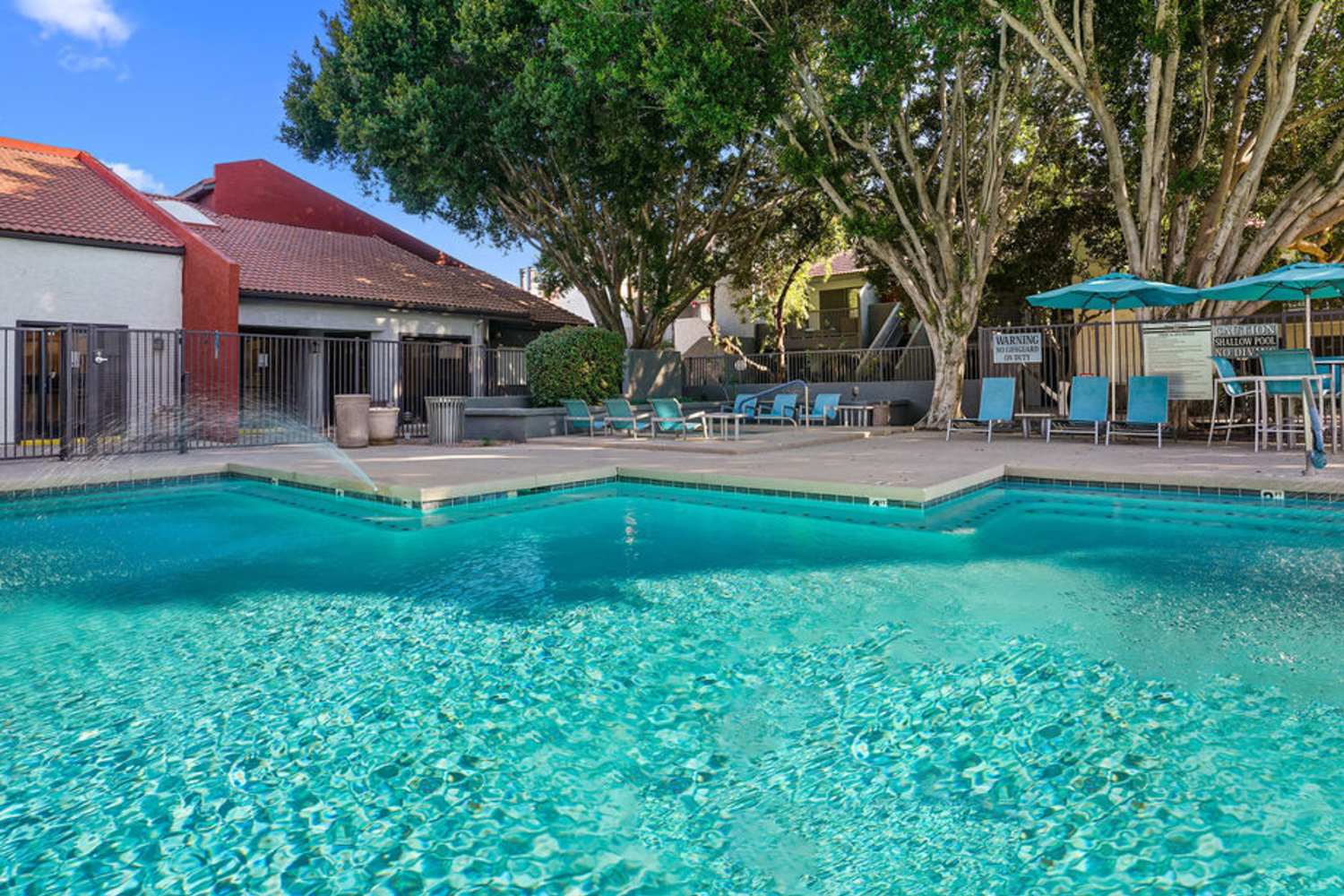 Clear outdoor pool at Waterford Place Apartments in Mesa, Arizona