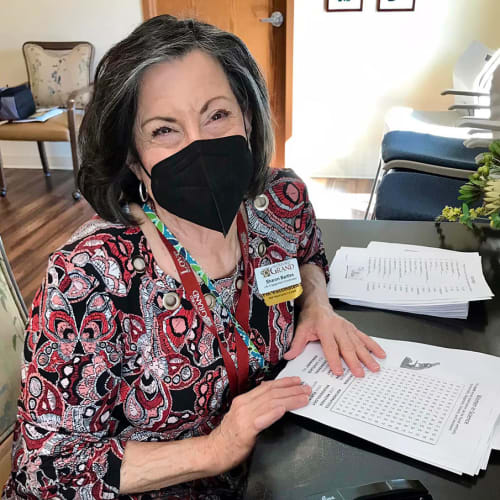 Resident holding a snack at The Oxford Grand Assisted Living & Memory Care in McKinney, Texas