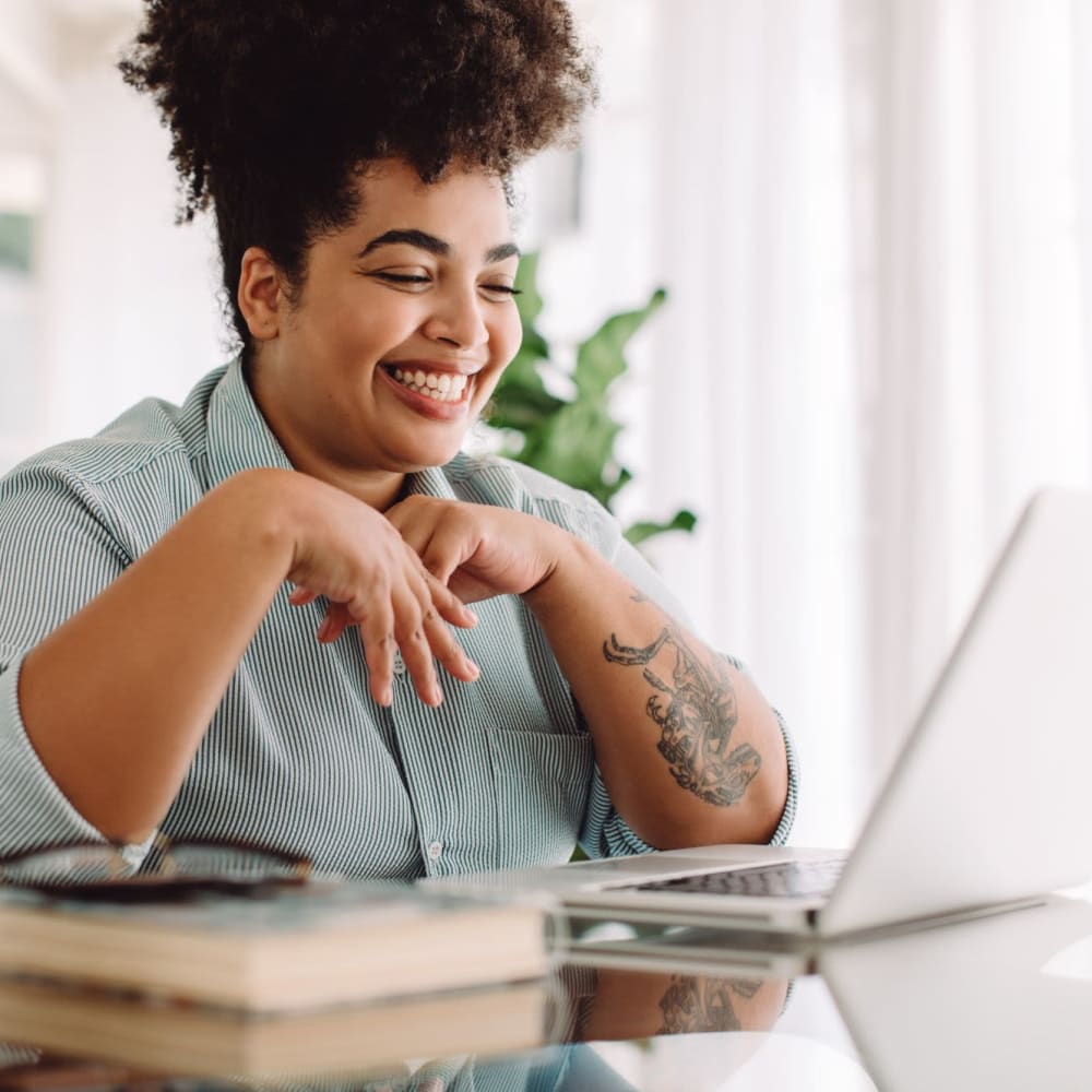 Resident in a virtual meeting working from home at Wisdom Place in Modesto, California