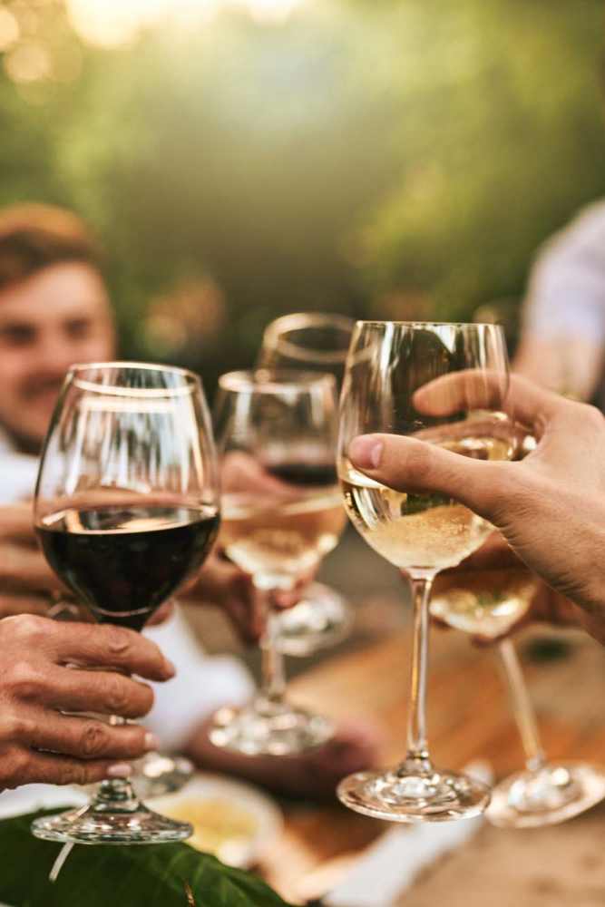 A group of residents tasting glasses near Avalon I Apartments in North Charleston, South Carolina