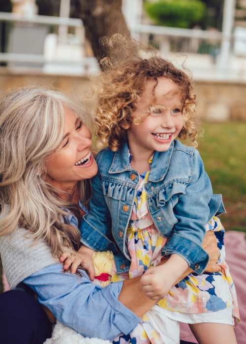 Mother and daughter in a park near The Village at SoTa in Tacoma, Washington