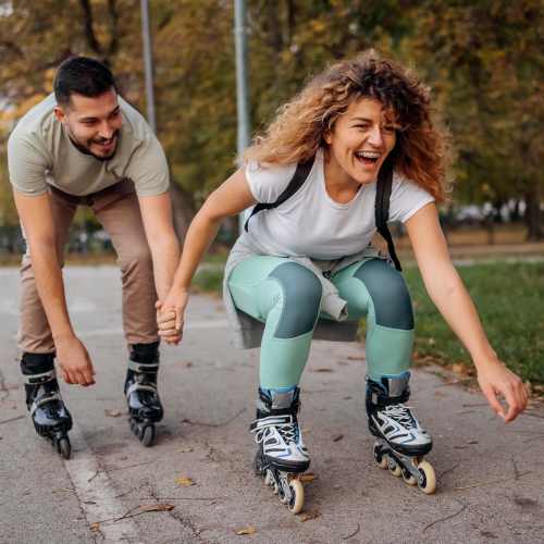 Couple roller skating in the park near Bayview Student Living in North Miami, Florida 