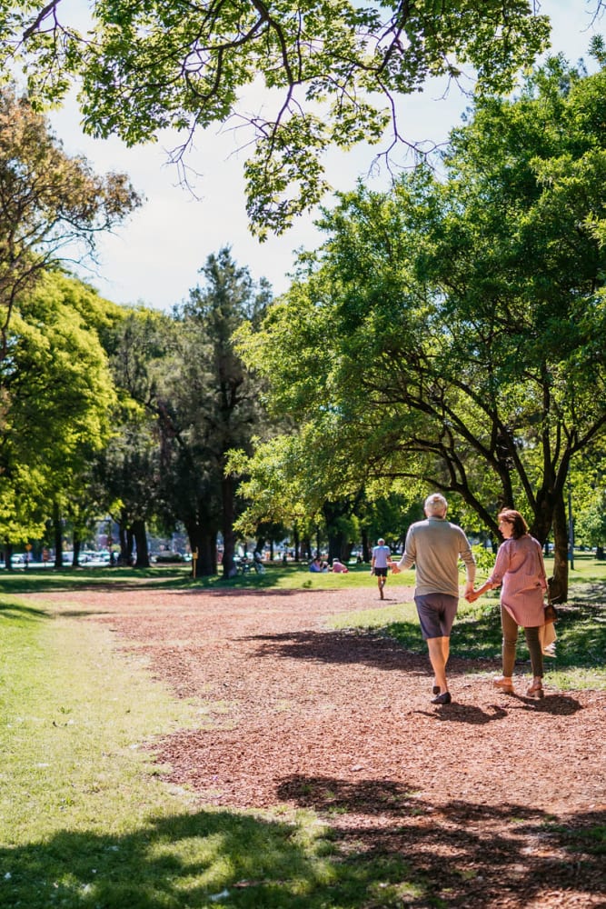 Resident going for a walk in the park near Overlook at Sugar Hill in Buford, Georgia