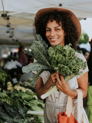 A women enjoying shopping at the farmer's market near The Columbia at the Waterfront in Vancouver, Washington