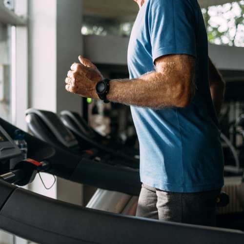Resident working out in the fitness center at 300 North Apartments in Baltimore, Maryland
