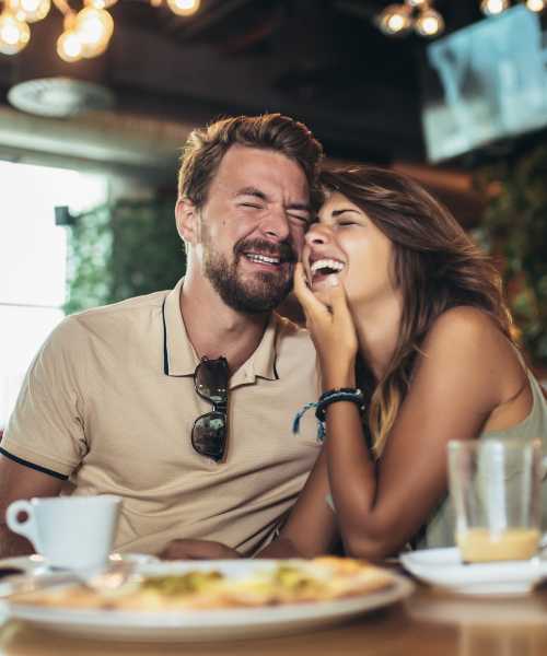 Resident having lunch in restaurant near The Waterfront on Hatchett Creek in Venice, Florida
