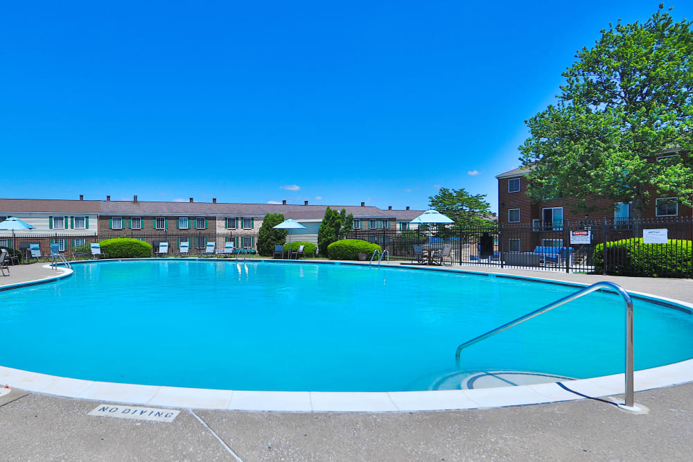 Sparkling blue swimming pool at Eagle's Crest Apartments in Harrisburg, Pennsylvania