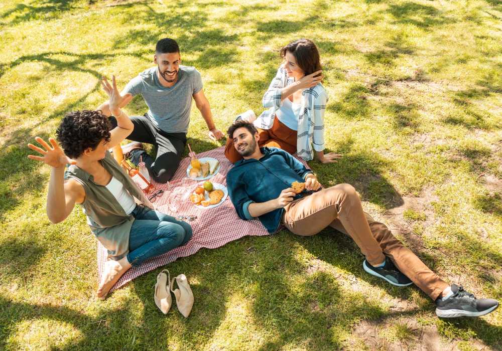 Resident friends enjoying in the park near The Reserve at Kanapaha in Gainesville, Florida
