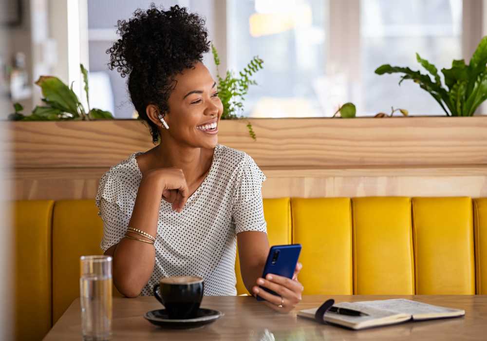 Resident having coffee near Maple Leaf Apartments in Merrillville, Indiana