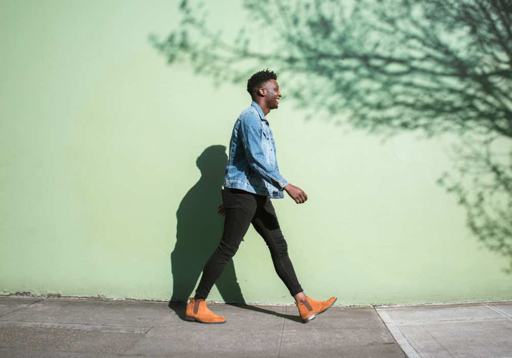 Resident walking near Maple Leaf Apartments in Merrillville, Indiana