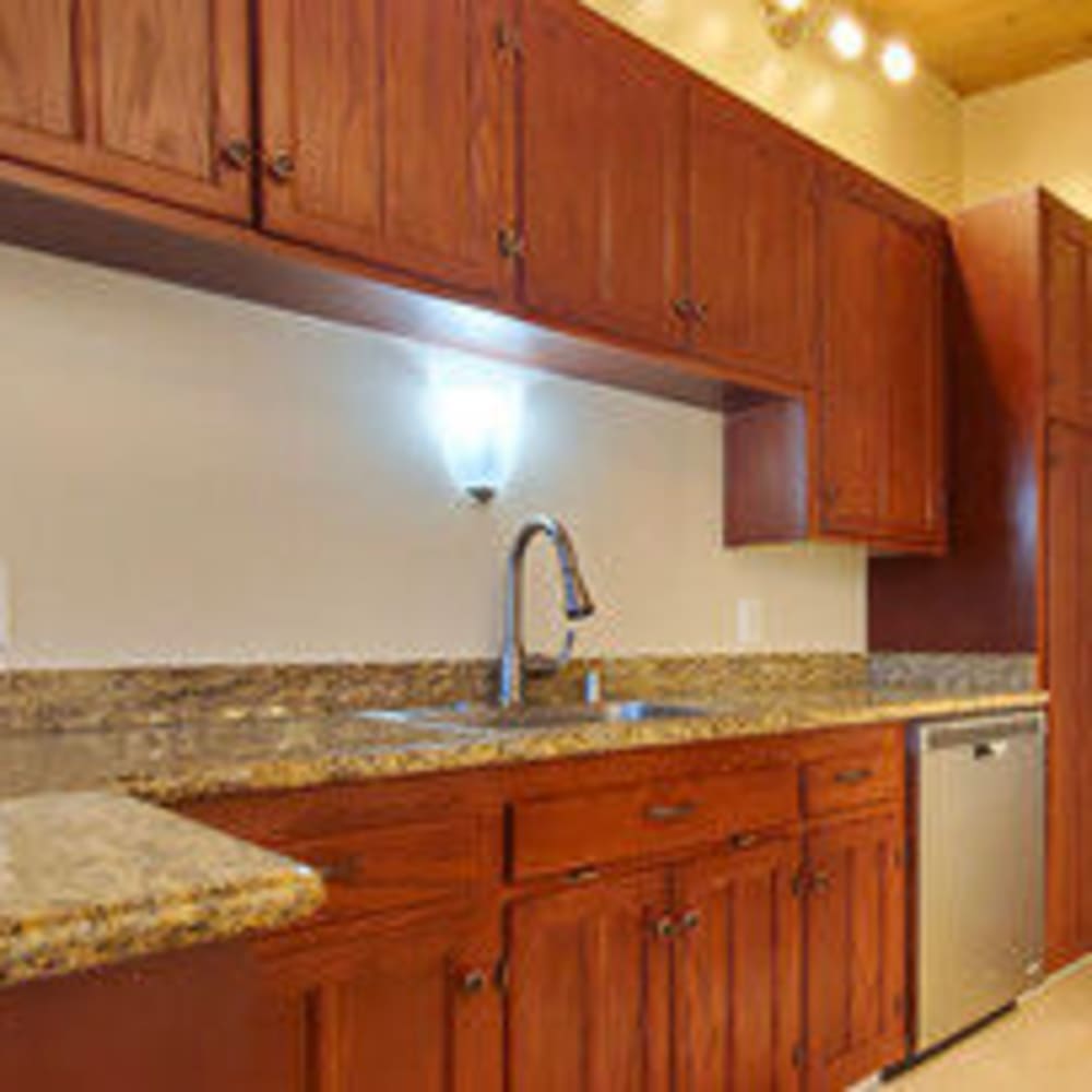 Custom cabinets with brushed nickel kitchen sink in an apartment home at our Glenwood community at Mission Rock at San Rafael in San Rafael, California