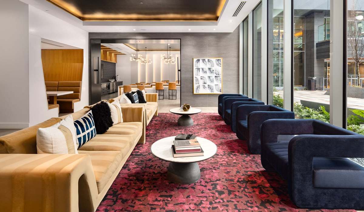 Resident lounge area with multiple couches at Novel Midtown in Atlanta, Georgia
