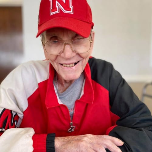 A resident smiling at Homestead House in Beatrice, Nebraska