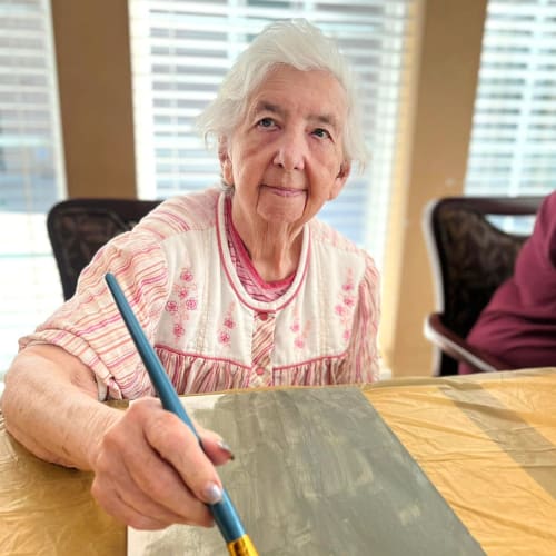 Happy resident at Oxford Glen Memory Care at Owasso in Owasso, Oklahoma